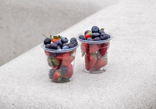 young people eating berries street 23 2150163642